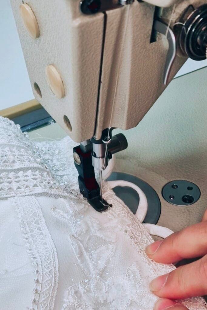 Bridal alteration sewing detail on lace wedding dress
